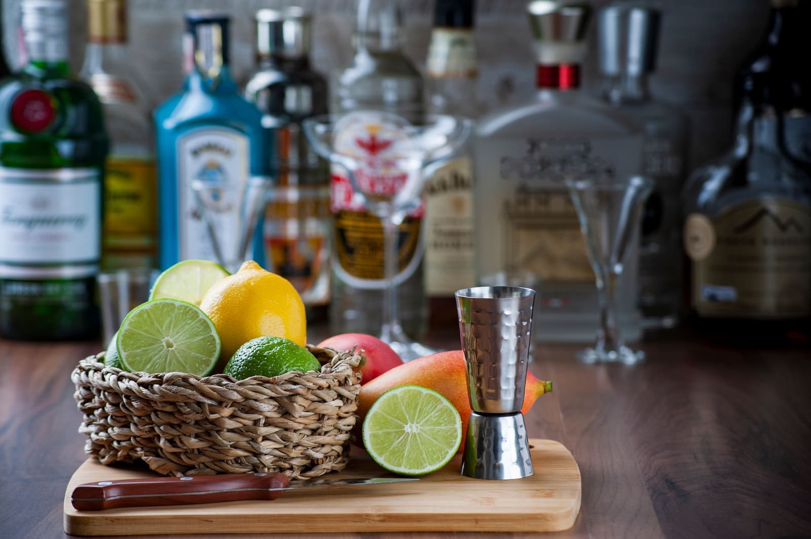 Bar tools arranged on a wooden counter