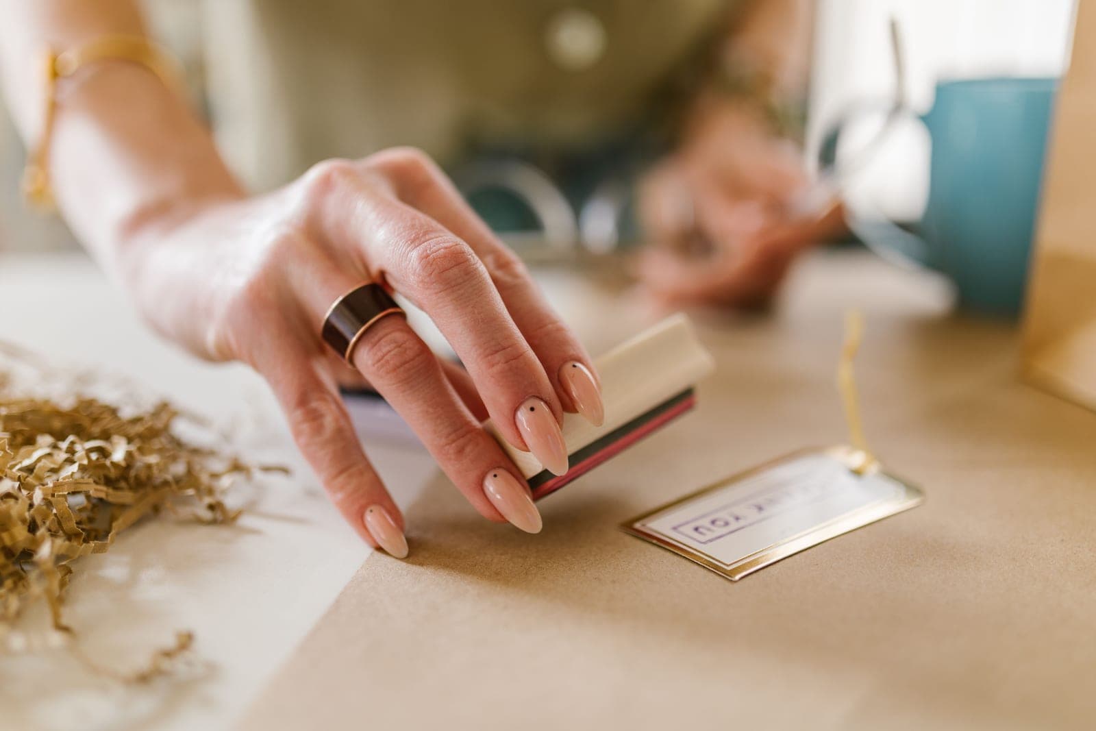 A small wrapped present on a wooden desk